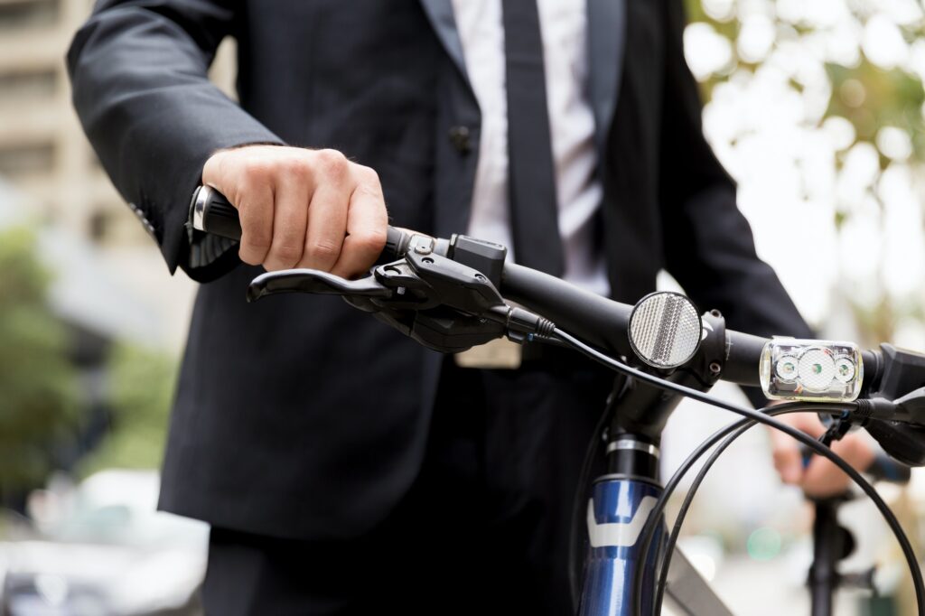 Young businessmen with a bike